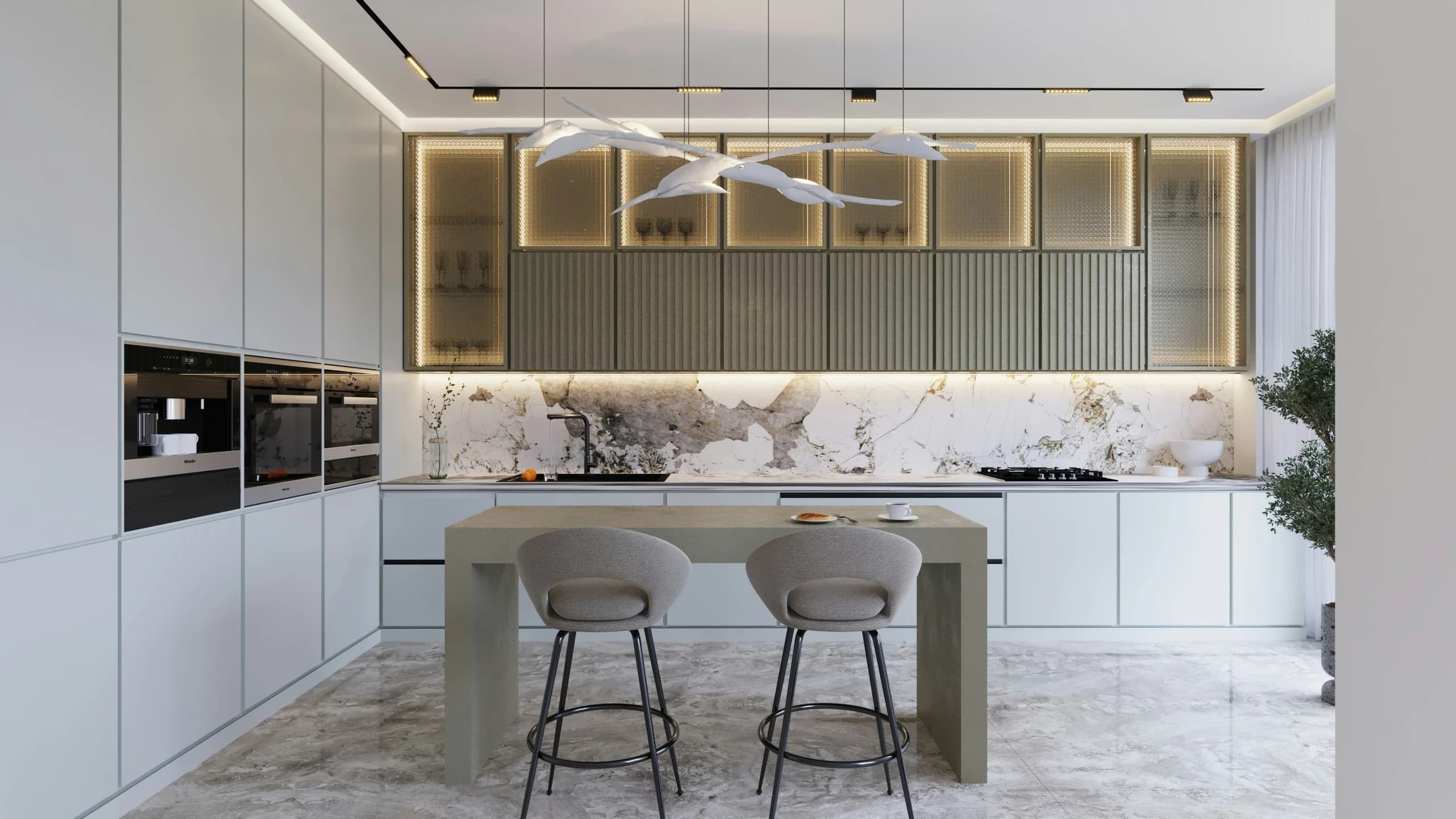 Contemporary kitchen with pale cabinetry, fluted upper fronts, lit display cabinets, a veined splashback and sculptural bird-shaped pendant lights